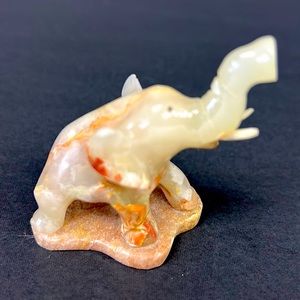 Vintage miniature hand carved  onyx trunk up elephant figure